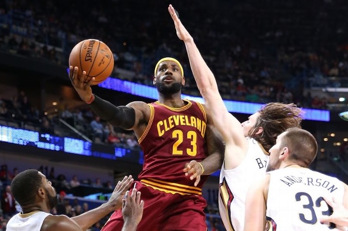 LeBron James driving against New Orleans Pelicans on December 12, 2014