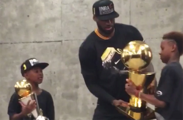 Video: LeBron James Shares Championship Trophy With Sons