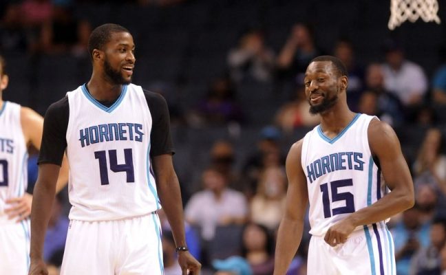 Michael Kidd-Gilchrist and Kemba Walker