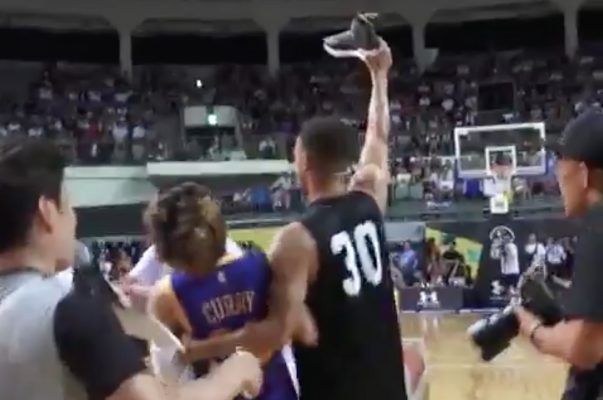 Video: Stephen Curry Throws Away Fan's LeBron Sneakers on Asia Tour