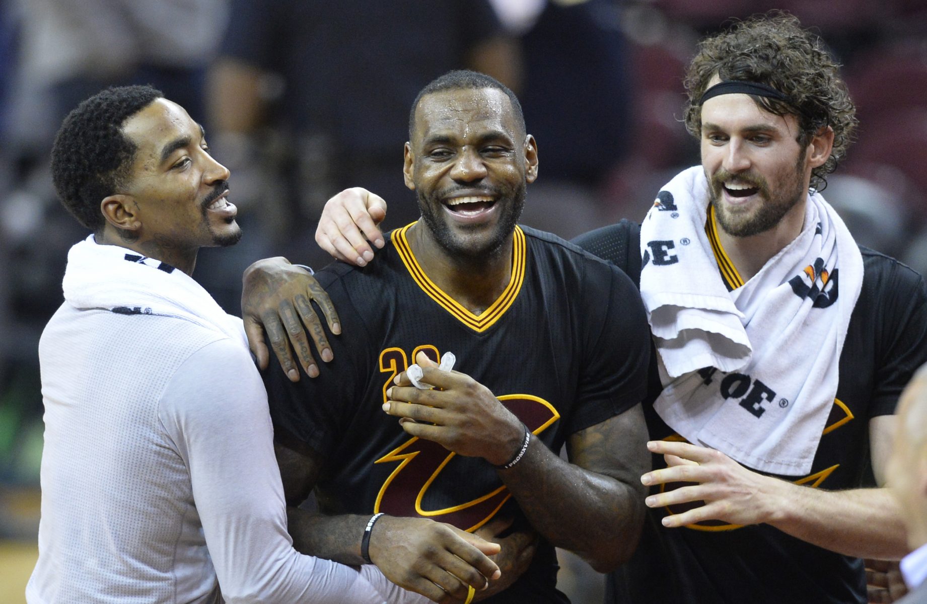 J.R. Smith, LeBron James, and Kevin Love